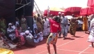 Lady dances to the Kete rhythm